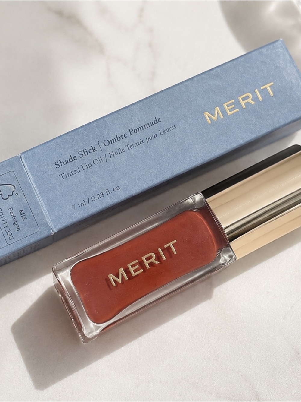 Merit lip oil